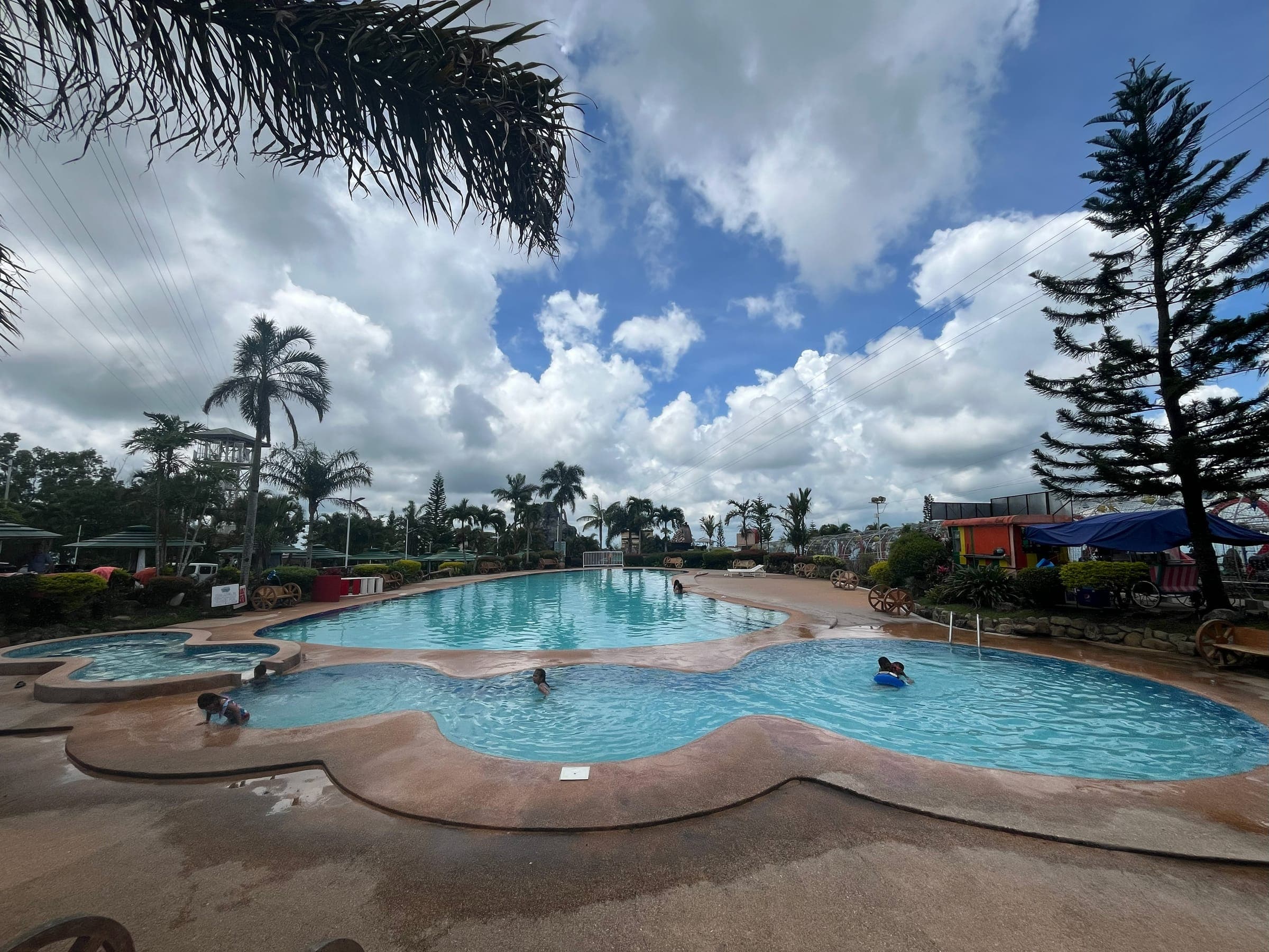 Looking out over the pools toward the Negros lowlands