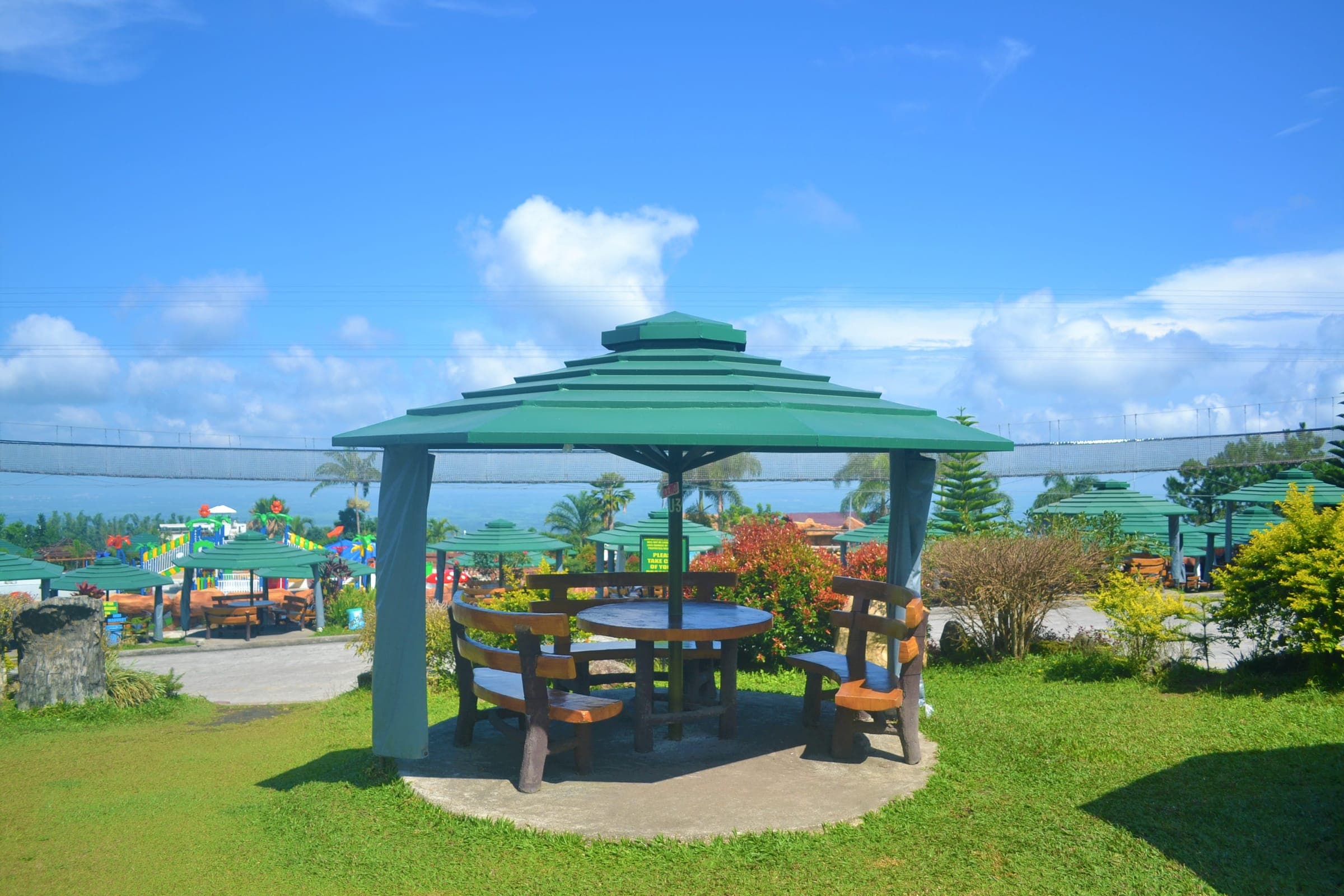 Umbrella huts beside the pools